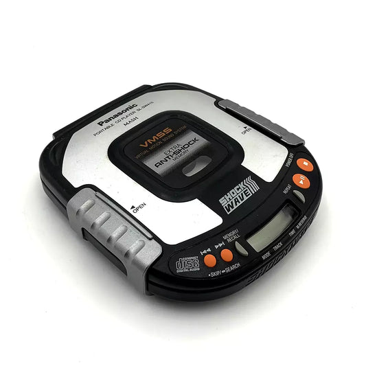 (Pre-Owned, Very Good) Panasonic Shock Wave SL-SW415 Portable CD Player With Rugged Shock Resistant Design (Silver and Black) (60 Days Warranty) + 1 Music CD