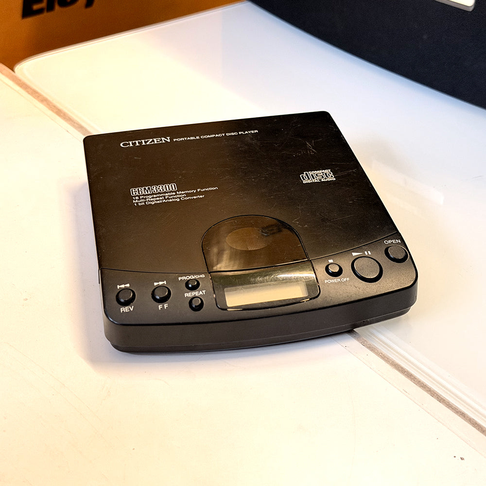 (Pre-Owned, Good) Citizen CBM3300 Portable CD Player (Black) (60 Days Warranty) + 1 Music CD