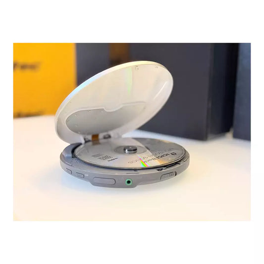 (Pre-Owned, Good) Philips AX-2400 Portable CD Player With 45 Seconds Skip Protection (Silver) + 1 Music CD