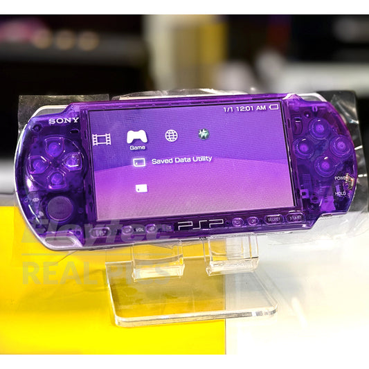 (Pre-Owned, Very Good) Sony PlayStation Portable (PSP) 3000 (64GB Card with 60+ Games) (Also Link to 120+ Games) (Transparent Purple) (120 Days Warranty) + Apple EarPods + 2 Battery Packs