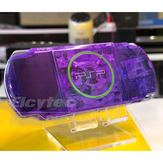 (Pre-Owned, Very Good) Sony PlayStation Portable (PSP) 3000 (64GB Card with 60+ Games) (Also Link to 120+ Games) (Transparent Purple) (120 Days Warranty) + Apple EarPods + 2 Battery Packs