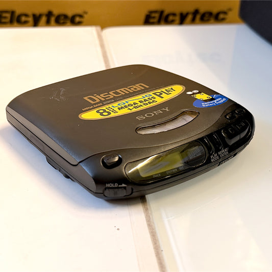 (Pre-Owned, Very Good) Sony Discman D-143 Portable CD Player (Gray) (60 Days Warranty) + 1 Music CD