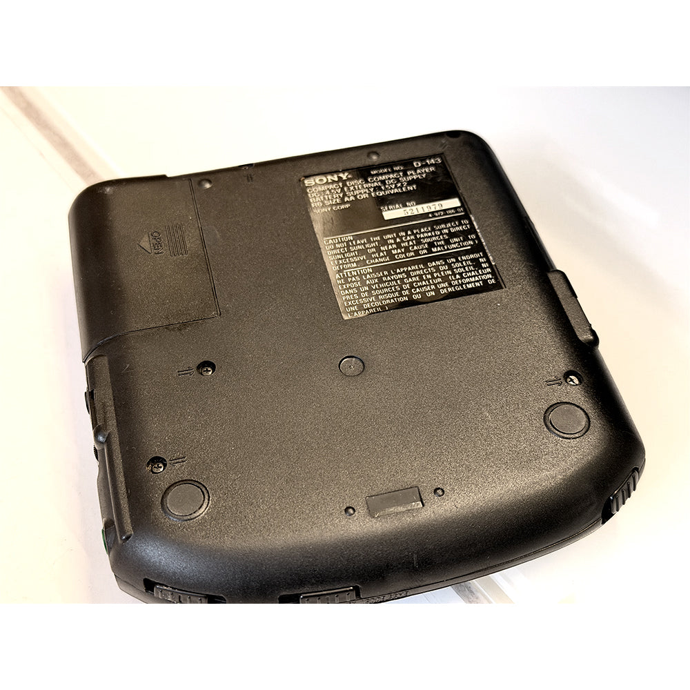 (Pre-Owned, Very Good) Sony Discman D-143 Portable CD Player (Gray) (60 Days Warranty) + 1 Music CD