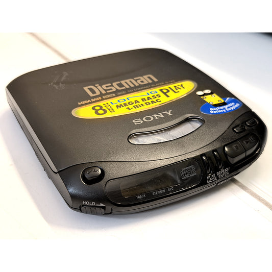 (Pre-Owned, Very Good) Sony Discman D-143 Portable CD Player (Gray) (60 Days Warranty) + 1 Music CD